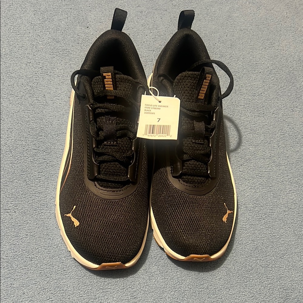 Puma womens Black Sneakers 7